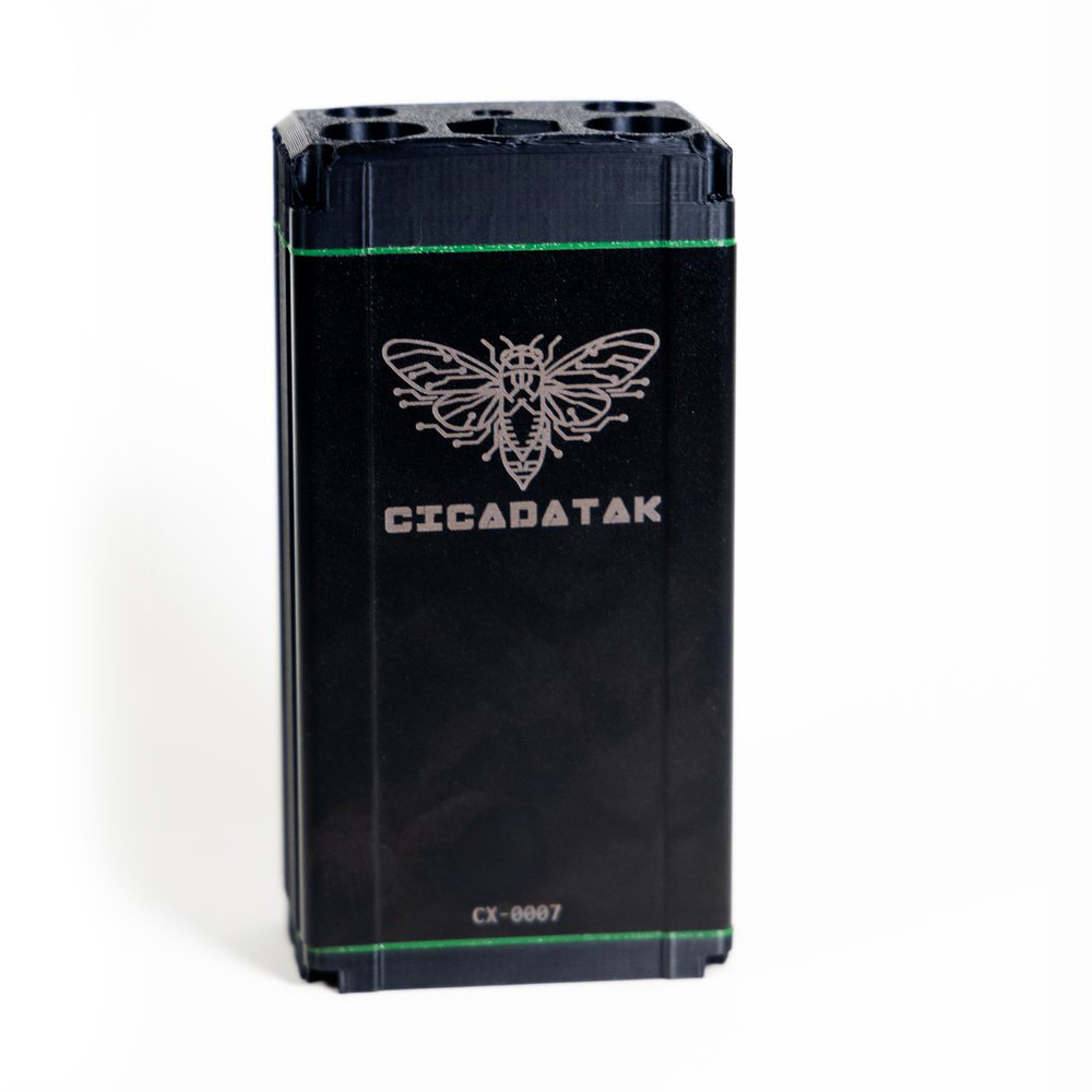 The Cicada Shell, assembled, with the CicadaTAK cicada logo engraved on the anodized face