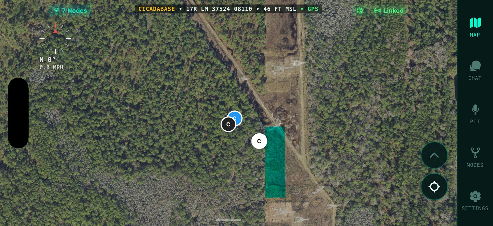 The map in landscape: compass rose top-left, own callsign and altitude in the top status line, side tab rail, satellite tiles with a saved route